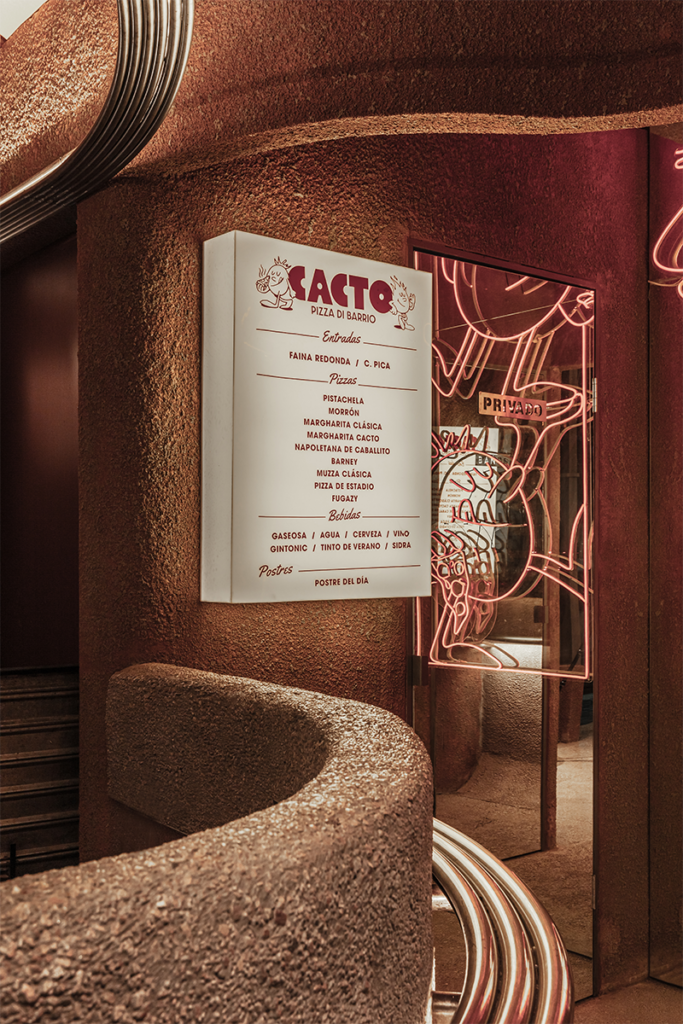 En el diseño de esta pizzería en argentina, el ladrillo es el material especial