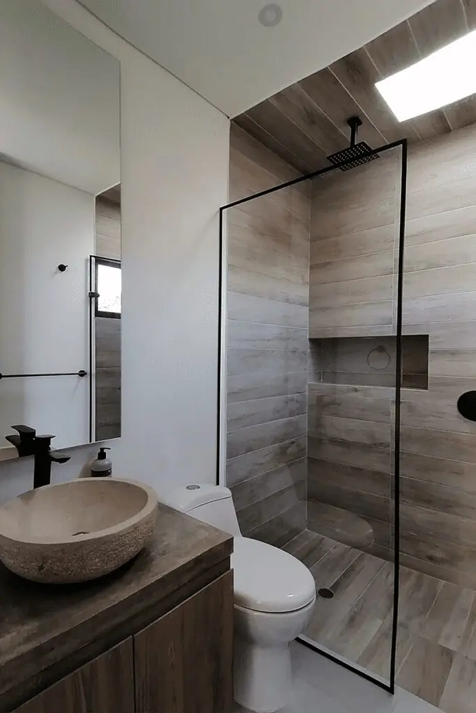 La arquitectura elegante de esta casa en forma de l se articula con el paisaje de la calera