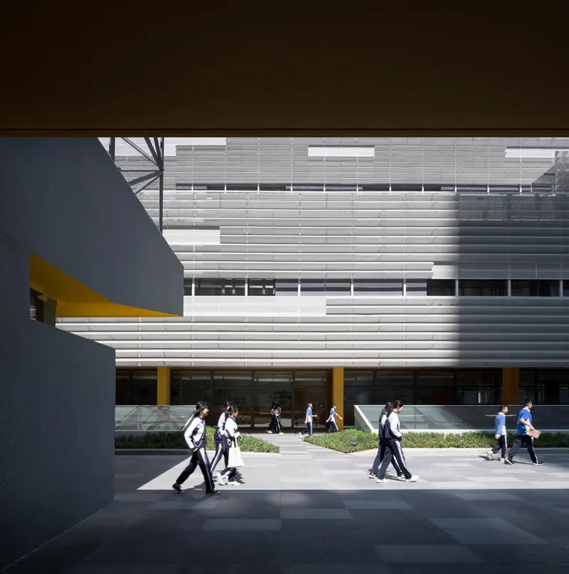 Press kit | 2606-03 - press release | shenzhen nanshan foreign language school - studio link-arc, llc - institutional architecture -  view of elementary school courtyard  - photo credit: shengliang su