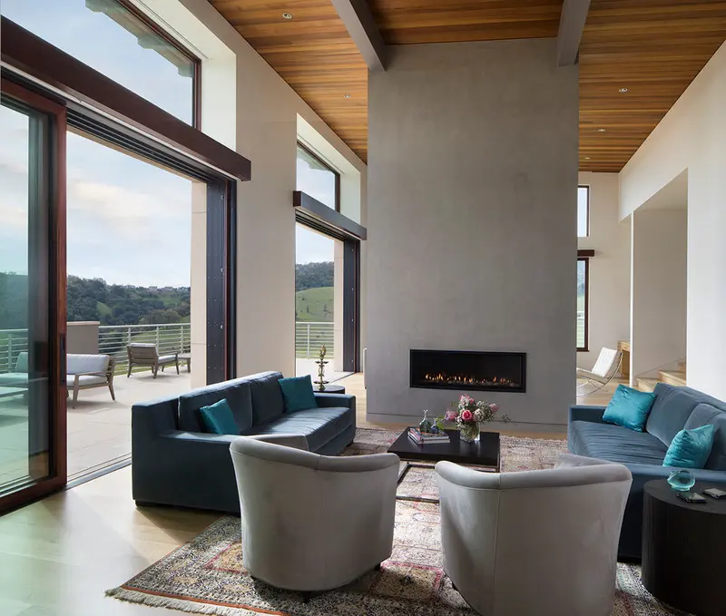 Press kit | 2757-28 - press release | architect and artist gustave carlson redefines california hygge - gustave carlson design - residential architecture -    carter acres residence: the generously-sized bronze-framed sliding doors gently pocket to maximize the dramatic views. - photo credit: paul dyer photography