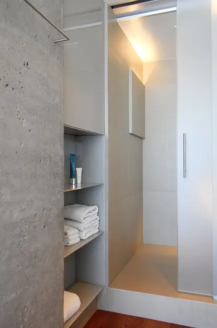 Press kit | 2933-02 - press release | ocean residence - heusch inc. - residential interior design - bathroom detail - concrete / glass / stone and wood   - photo credit: gerhard heusch 