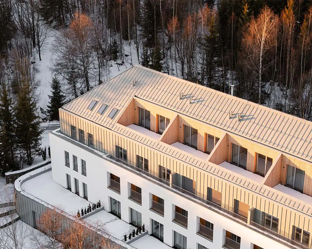 Habitar desde la simplicidad: apartamentos dúplex, galerías y terrazas ubicadas en un antiguo sanatorio Habitar desde la simplicidad: apartamentos dúplex, galerías y terrazas ubicadas en un antiguo sanatorio