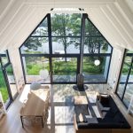yh2 architecture axxis 12 Una casa de madera con vista a un lago que permite una verdadera comunión con la naturaleza