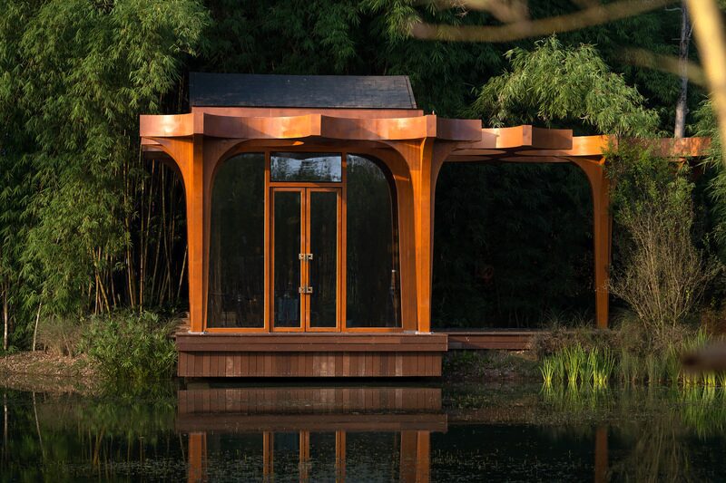 Un sorprendente salón cultural rodeado de bosque de bambú en china Un sorprendente salón cultural rodeado de bosque de bambú en china