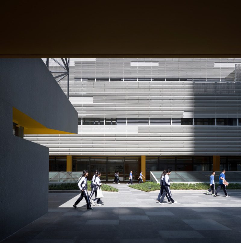 Press kit | 2606-03 - press release | shenzhen nanshan foreign language school - studio link-arc, llc - institutional architecture -  view of elementary school courtyard  - photo credit: shengliang su