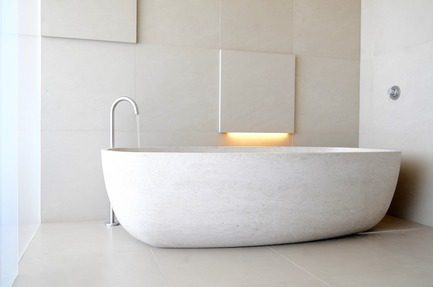 Press kit | 2933-02 - press release | ocean residence - heusch inc. - residential interior design - custom limestone bathtub   - photo credit: gerhard heusch 